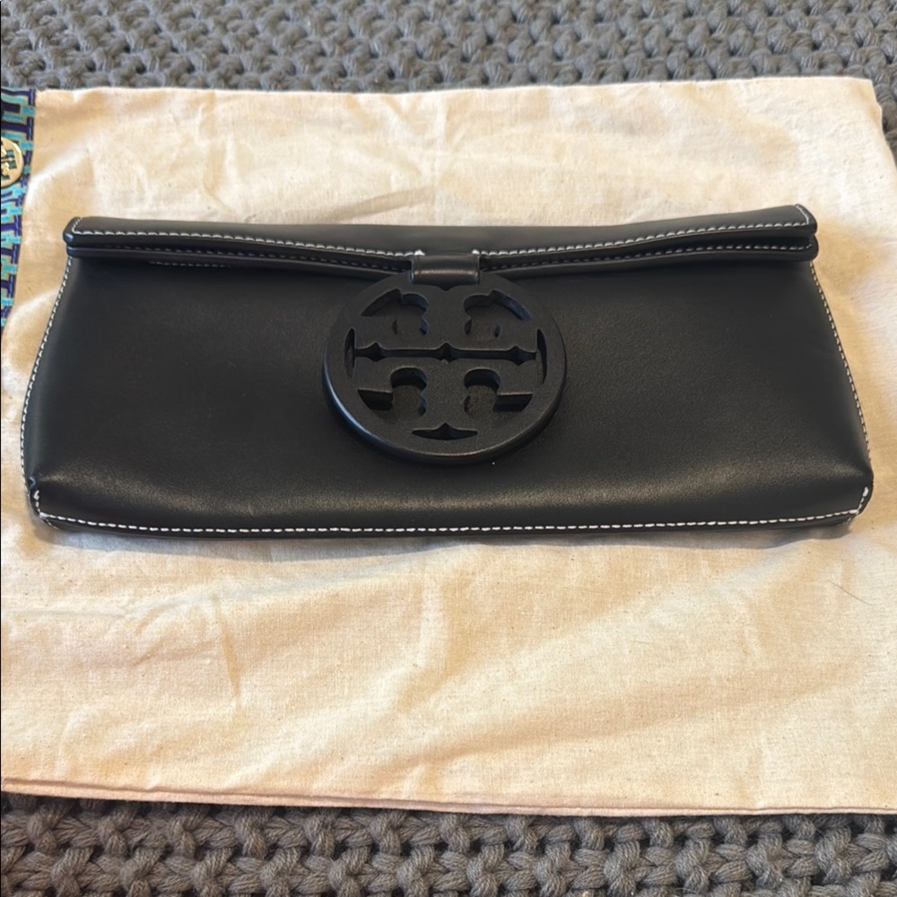 Chic Black Leather Tory Burch Clutch with Iconic Emblem